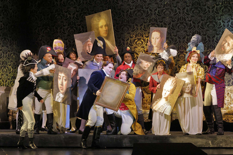 Mei Gui Zhang as Oscar, Michael Fabiano as Gustavus III, and members of the San Francisco Opera Chorus in Verdi's "Un Ballo in Maschera." Photo: Cory Weaver/San Francisco Opera