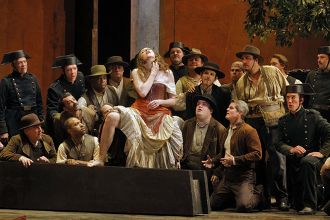 Eve-Maud Hubeaux as the title role and members of the San Francisco Opera Chorus in Bizet's "Carmen." Photo: Cory Weaver/San Francisco Opera