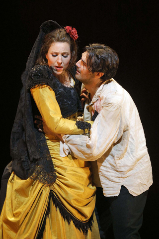 Eve-Maud Hubeaux as Carmen and Jonathan Tetelman as Don José in Bizet's "Carmen." Photo: Cory Weaver/San Francisco Opera