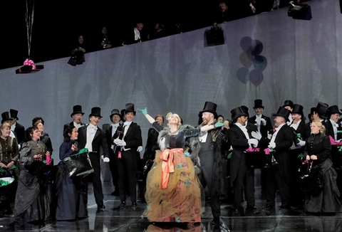 A scene from Massenet's "Manon" with Ellie Dehn in the title role and Timothy Mix as de Brétigny.  Photographer: Cory Weaver/San Francisco Opera.