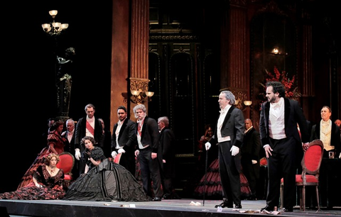 A scene from Verdi's "La Traviata" with Renée Rapier as Flora Bervoix, Anthony Reed as Doctor Grenvil, Aurelia Florian as Violetta Valéry, Amitai Pati as Gastone, Andrew G. Manea as Marquis d'Obigny, Artur Rucinski as Giorgio Germont, and Atalla Ayan as Alfredo Germont. Photographer: Cory Weaver/San Francisco Opera.