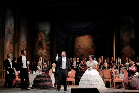 Amitai Pati as Gastone, Atalla Ayan as Alfredo Germont, and Aurelia Florian as Violetta Valéry in Verdi's "La Traviata." Photographer: Cory Weaver/San Francisco Opera.