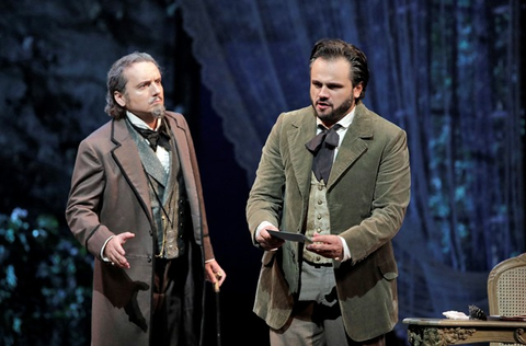 Artur Rucinski as Giorgio Germont and Atalla Ayan as Alfredo Germont in Verdi's "La Traviata." Photographer: Cory Weaver/San Francisco Opera.