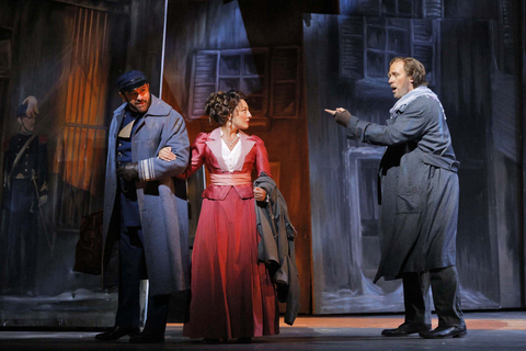 Nikolas Nackley (Customhouse Officer), Andrea Carroll (Musetta), and Lucas Meachem (Marcello), La Bohème, Giacomo Puccini. San Francisco Opera, 2024-25. Photo: Cory Weaver/San Francisco Opera