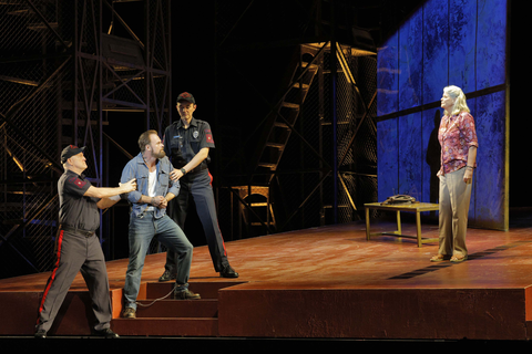 Ryan McKinny as Joseph De Rocher and Susan Graham as Mrs. Patrick De Rocher with guards Philip Skinner and Samuel Kidd in Jake Heggie and Terrence McNally's "Dead Man Walking." Photo: Cory Weaver/San Francisco Opera