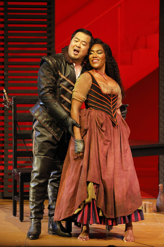 Yongzhao Yu as the Duke of Mantua and J'Nai Bridges as Maddalena in Verdi's "Rigoletto."