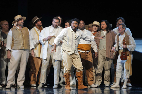 Olivier Zerouali (center) as Fiorello with members of the San Francisco Opera Chorus in Rossini's "The Barber of Seville." Photo: Cory Weaver/San Francisco Opera