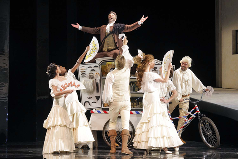 Joshua Hopkins as Figaro and dancers in Rossini's "The Barber of Seville." Photo: Cory Weaver/San Francisco Opera