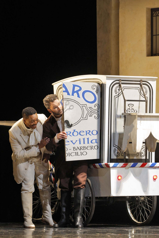 Levy Sekgapane as Count Almaviva and Joshua Hopkins as Figaro in Rossini's "The Barber of Seville." Photo: Cory Weaver/San Francisco Opera