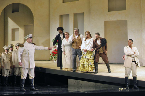 A scene from Rossini's "The Barber of Seville" with Thomas Kinch as an Officer, Riccardo Fassi as Don Basilio, Mary Hoskins as Berta, Renato Girolami as Doctor Bartolo, Maria Kataeva as Rosina, Joshua Hopkins as Figaro, and Levy Sekgapane as Count Almaviva. Photo: Cory Weaver/San Francisco Opera