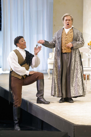 Justin Austin as Figaro and Patrick Carfizzi as Doctor Bartolo in Rossini's "The Barber of Seville." Photo: Cory Weaver/San Francisco Opera