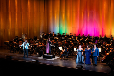 Robert Mollicone conducting the San Francisco Opera Orchestra with Reginald Smith, Jr. (left) and Sadie Cheslak, Alexa Frankian, Thomas Kinch at San Francisco Opera's "Pride Concert," June 26, 2026. Photo: Reneff-Olson Productions/San Francisco Opera