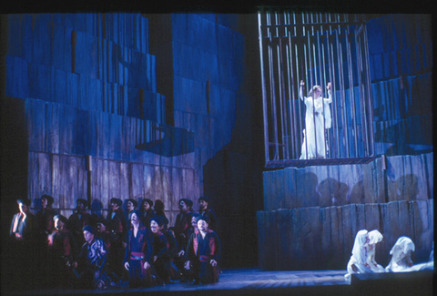 Hasmik Papian (Olimpia), Chorus, Arshak II, Tigran Chukhadjian. San Francisco Opera, 2001-02. Photographer: Ken Friedman/San Francisco Opera.