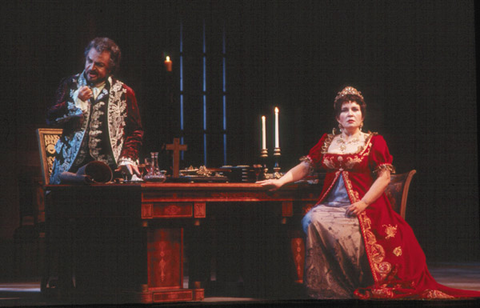 Franz Grundheber (Baron Scarpia), Eva Urbanová (Tosca), Tosca, Giacomo Puccini. San Francisco Opera, 2001-02. Photographer: Ken Friedman/San Francisco Opera.