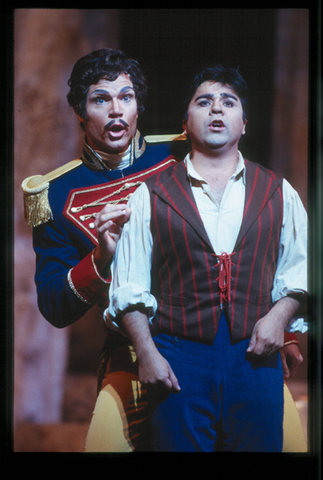 Rodney Gilfry (Belcore), Tito Beltrán (Nemorino), L'Elisir d'Amore, Gaetano Donizetti. San Francisco Opera, 2000-01. Photographer: Ken Friedman/San Francisco Opera.