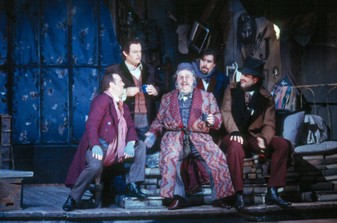 Scott Hendricks (Marcello), Frank Lopardo (Rodolfo), Peter Strummer (Benoît), Brad Alexander (Schaunard), Friedemann Rӧhlig (Colline), La Bohème, Giacomo Pucinni. San Francisco Opera, 2003-04. Photographer: Ken Friedman/San Francisco Opera.