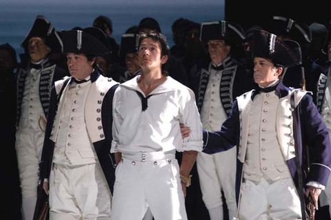 Nathan Gunn (Billy Budd), Chorus, Supernumeraries, Billy Budd, Benjamin Britten. San Francisco Opera, 2004-05. Photographer: Larry Merkle/San Francisco Opera.