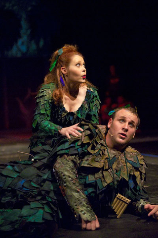 Nikki Enfield (Papagena), Lucas Meachem (Papageno), Die Zauberflote, Wolfgang Amadeus Mozart. San Francisco Opera 2005-06. Photographer: Terrence McCarthy/San Francisco Opera.