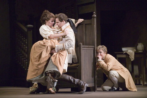 Camilla Tilling (Susanna), Peter Mattei (Count Almaviva), Claudia Mahnke (Cherubino), Le Nozze di Figaro, Wolfgang Amadeus Mozart. San Francisco Opera, 2005-06. Photographer: Terrence McCarthy/San Francisco Opera.