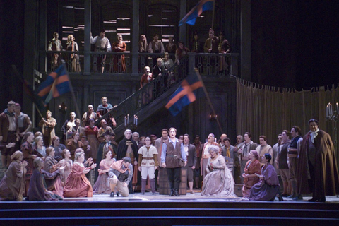 Anna Christy (Oscar), Marcus Haddock (Riccardo), Tichina Vaughn (Ulrica), Chorus, Supernumeraries, Un Ballo in Maschera, Giuseppe Verdi. San Francisco Opera, 2006-07. Photographer: Terrence McCarthy/San Francisco Opera.