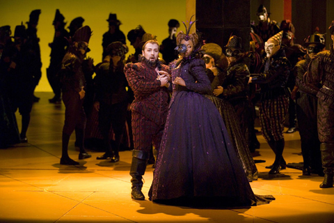 Giuseppe Gipali (Duke of Mantua), Kimwana Doner (Countess Ceprano), Chorus, Rigoletto, Giuseppe Verdi. San Francisco Opera, 2006-07. Photographer: Terrence McCarthy/San Francisco Opera.