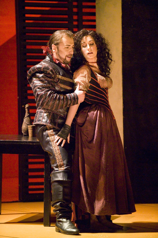 Giuseppe Gipali (Duke of Mantua), Katherine Rohrer (Maddalena), Rigoletto, Giuseppe Verdi. San Francisco Opera, 2006-07. Photographer: Terrence McCarthy/San Francisco Opera.