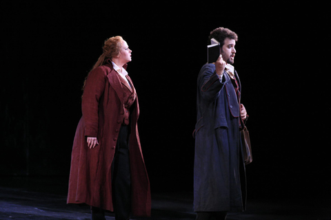 Twyla Robinson (Donna Elvira), Oren Gradus (Leporello), Don Giovanni, Wolfgang Amadeus Mozart. San Francisco Opera, 2006-07. Photographer: John Lee/San Francisco Opera.