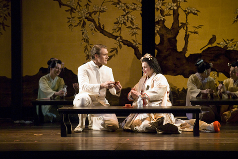 Brandon Jovanovich (Pinkerton), Patricia Racette (Cio-Cio-San), Chorus, Madama Butterfly, Giacomo Puccini. San Francisco Opera, 2007-08. Photographer: Terrence McCarthy/San Francisco Opera.