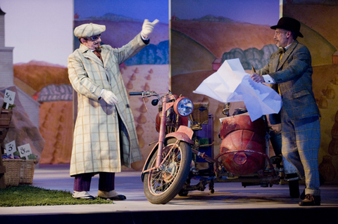 Alessandro Corbelli (Dulcamara), Steve Carp (Assistant), L'Elisir d'Amore, Gaetano Donizetti. San Francisco Opera, 2008-09. Photographer: Terrence McCarthy/San Francisco Opera.