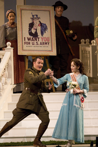 Eugene Brancoveanu (Belcore), Ji Young Yang (Adina), Chorus, The Elixir of Love for Families, Gaetano Donizetti. San Francisco Opera, 2008-09. Photographer: Kristen Loken/San Francisco Opera.