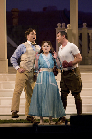 Alek Schrader (Nemorino), Ji Young Yang (Adina), Eugene Brancoveanu (Belcore), The Elixir of Love for Families, Gaetano Donizetti. San Francisco Opera, 2008-09. Photographer: Kristen Loken/San Francisco Opera.