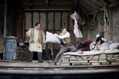 Quinn Kelsey (Marcello), Piotr Beczala (Rodolfo), Oren Gradus (Colline), Schaunard (Brian Leerhuber), La Bohème, Giacomo Puccini. San Francisco Opera, 2008-09. Photographer: Terrence McCarthy/San Francisco Opera.