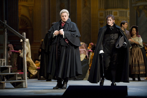 Lado Ataneli (Baron Scarpia), Joel Sorensen (Spoletta), Chorus, Tosca, Giacomo Puccini. San Francisco Opera, 2008-09. Photographer: Terrence McCarthy/San Francisco Opera.