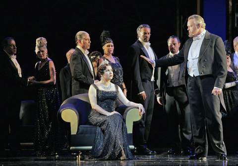 Anna Netrebko (Violetta Valéry ), Dale Travis (Baron Douphol), Chorus, La Traviata, Giuseppe Verdi. San Francisco Opera, 2008-09. Photographer: Cory Weaver/San Francisco Opera.