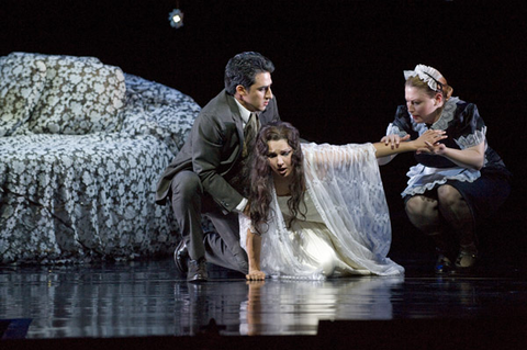 Charles Castronovo (Alfredo Germont), Anna Netrebko (Violetta Valéry), Renée Tatum (Annina), La Traviata, Giuseppe Verdi. San Francisco Opera, 2008-09. Photographer: Terrence McCarthy/San Francisco Opera.