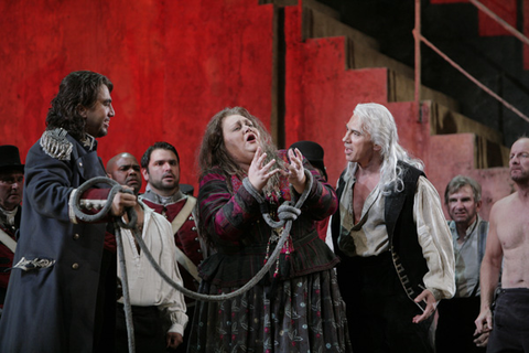 Burak Bilgili (Ferrando), Stephanie Blythe (Azucena), Dmitri Hvorostovsky (Count di Luna), Il Trovatore, Guiseppe Verdi. San Francisco Opera, 2009-10. Photographer: Cory Weaver/San Francisco Opera.