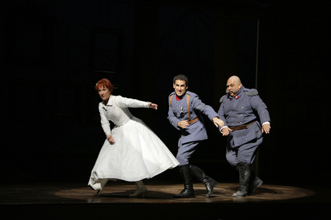 Diana Damrau (Marie), Juan Diego Flórez, (Tonio), Bruno Praticò (Sulpice), La Fille du Régiment, Gaetano Donizetti. San Francisco Opera, 2009-10. Photographer: Cory Weaver/San Francisco Opera.