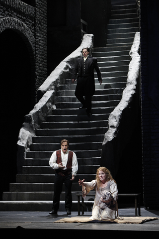 Stefano Secco (Faust), John Relyea (Méphistophélès), Patricia Racette (Marguerite), Faust, Charles François Gounod. San Francisco Opera, 2009-10. Photographer: Cory Weaver/San Francisco Opera.