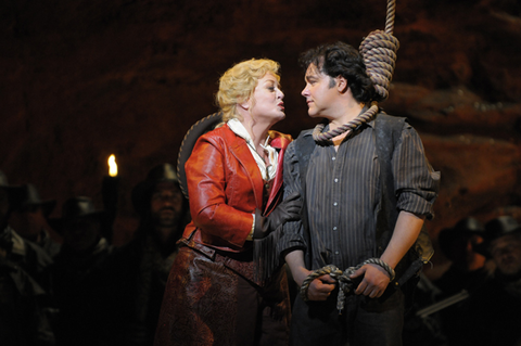 Deborah Voigt (Minnie), Salvatore Licitra (Dick Johnson), La Fanciulla del West, Giacomo Puccini. San Francisco Opera, 2009-10. Photographer: Kevin Berne/San Francisco Opera.