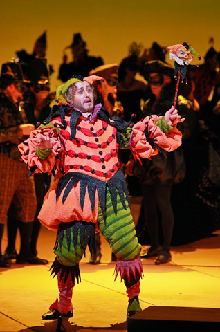 Marco Vratogna (Rigoletto), Chorus, Rigoletto, Giuseppe Verdi. San Francisco Opera, 2012-13. Photographer: Cory Weaver/San Francisco Opera.