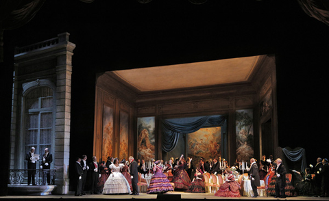 Nicole Cabell (Violetta Valéry), Zanda Svede (Flora Bervoix), Dale Travis (Baron Douphol), Hadleigh Adams (Marquis d'Obigny), Chorus, La Traviata, Giuseppe Verdi. San Francisco Opera, 2013-14. Photographer: Cory Weaver/San Francisco Opera.