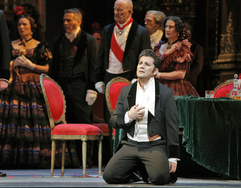 Saimir Pirgu (Alfredo Germont), Chorus, La Traviata, Giuseppe Verdi. San Francisco Opera, 2013-14. Photographer: Cory Weaver/San Francisco Opera.