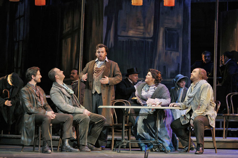 Hadleigh Adams (Schaunard), Christian Van Horn (Colline) Giorgio Berrugi (Rodolfo), Leah Crocetto (Mimì), Brian Mulligan (Marcello), La Bohème, Giacomo Puccini. San Francisco Opera, 2014-15. Photographer: Cory Weaver/San Francisco Opera.