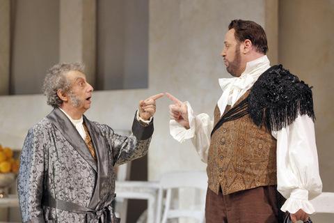 Alessandro Corbelli (Doctor Bartolo), Lucas Meachem (Figaro), Il Barbiere di Siviglia, Gioachino Rossini. San Francisco Opera, 2015-16. Photographer: Cory Weaver/San Francisco Opera.