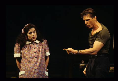 Elizabeth Futral (Stella Kowalski), Rodney Gilfry (Stanley Kowalski), A Streetcar Named Desire, André Previn. San Francisco Opera, 1998-99. Photographer: Marty Sohl/San Francisco Opera.