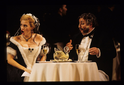 Ainhoa Arteta (Musetta), Peter Strummer (Alcindoro), La Bohème, Giacomo Puccini. San Francisco Opera, 1999-2000. Photographer: Ken Friedman/San Francisco Opera.