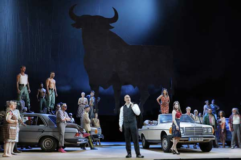 Zachary Nelson (Escamillo), Amina Edris (Frasquita), Ginger Costa-Jackson (Carmen), Chorus, Carmen, Georges Bizet. San Francisco Opera, 2015-16. Photographer: Cory Weaver/San Francisco Opera.