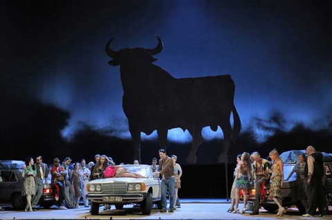 Ginger Costa-Jackson (Carmen), Adam Diegel (Don José), Chorus, Carmen, Georges Bizet. San Francisco Opera, 2015-16. Photographer: Cory Weaver/San Francisco Opera.