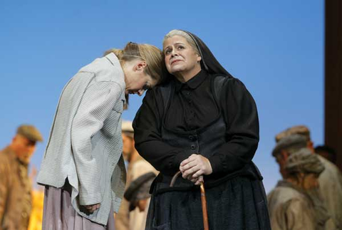 Malin Byström (Jenůfa), Jill Grove (Grandmother Buryjovka), Chorus, Jenůfa, Leoš Janáček. San Francisco Opera, 2015-16. Photographer: Cory Weaver/San Francisco Opera.