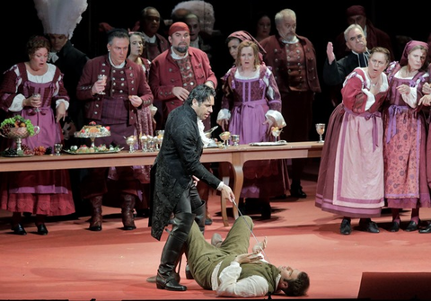 Ildebrando D'Arcangelo (Don Giovanni), Erik Anstine (Leporello), Chorus, Don Giovanni, Wolfgang Amadeus Mozart. San Francisco Opera, 2016-17. Photographer: Cory Weaver/San Francisco Opera.